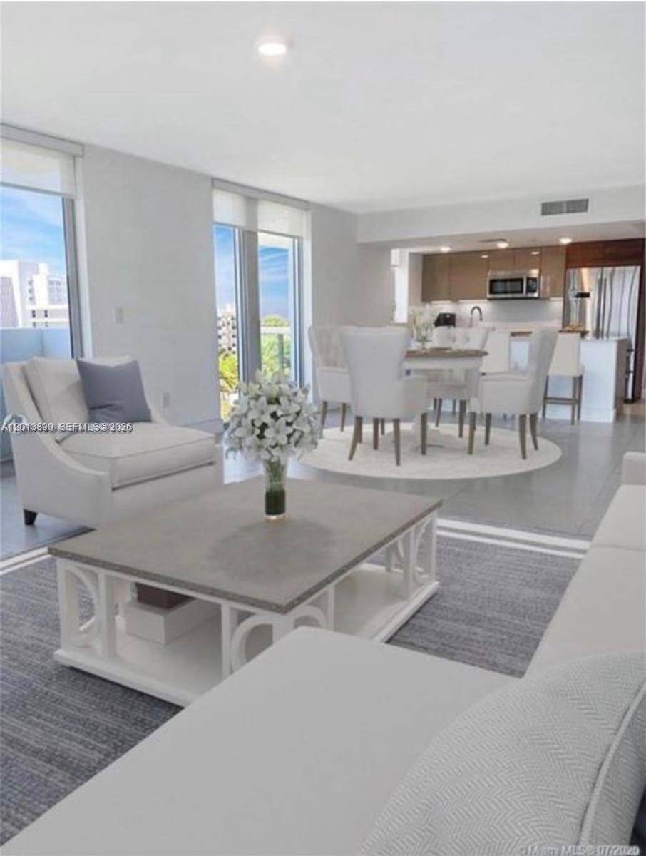 Live in this moat remarkable spacious, bright, 2bd plus den, corner unit with direct canal views and some Atlantic Ocean.