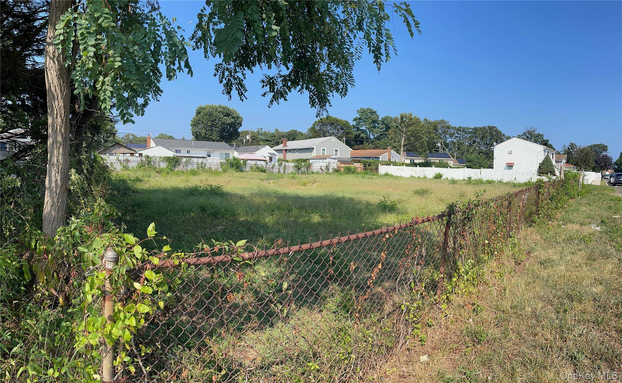 Spacious 125x100 lot in the heart of Lindenhurst.