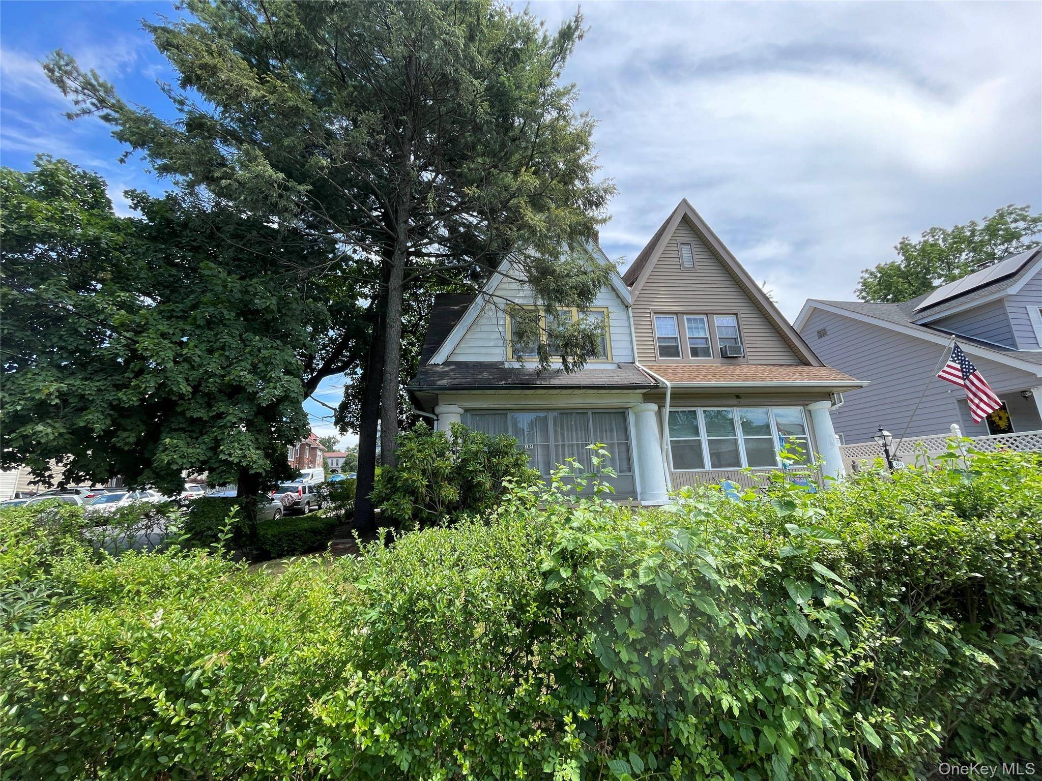 Welcome to 384 Hawthorne Ave a charming 3 bedroom, 1 bath semi attached home located on a quiet, tree lined street in the heart of Yonkers.