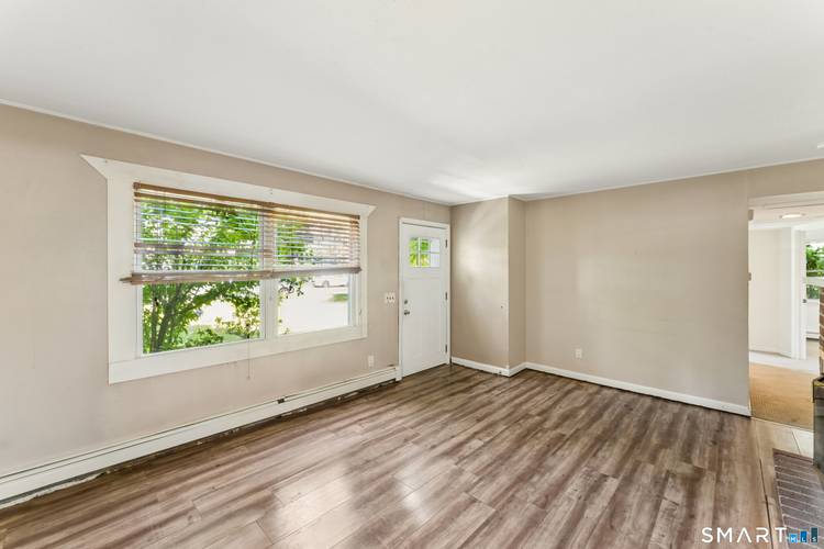 Don't miss this rare opportunity in Norwalk's highly sought after Wolfpit neighborhood !