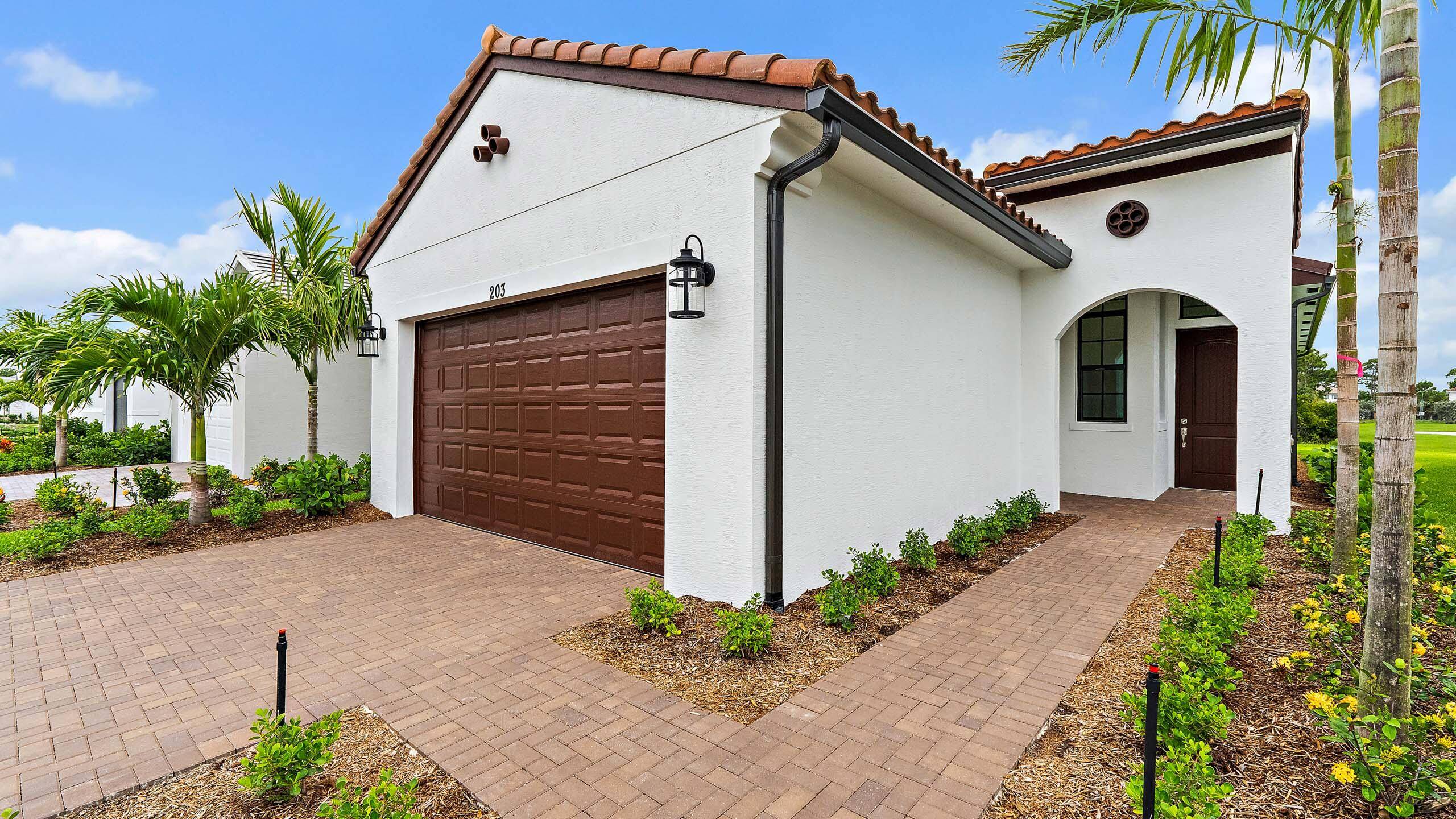 NEW CONSTRUCTION Home with Lakeview in Gated, Nature Focused Community Rivella.