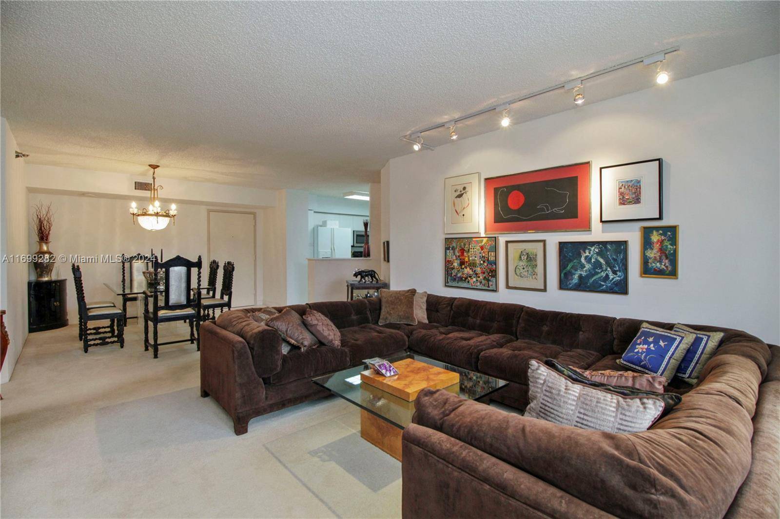 2 2 CONVENIENT LOW FLOOR UNIT WITH SAME FLOOR PARKING SPACE IN A FULL SERVICE BLDG W RESORT STYLE AMENITIES.