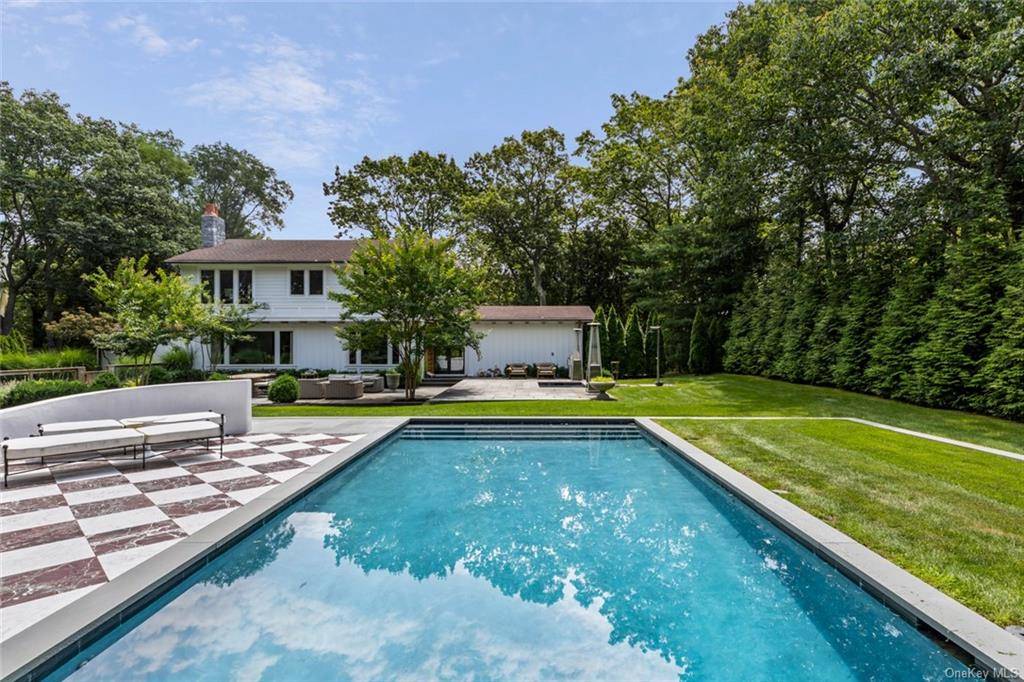This is it if you are looking for one of the most curated and flawlessly designed homes in Melville, Half Hollow Hills School District.