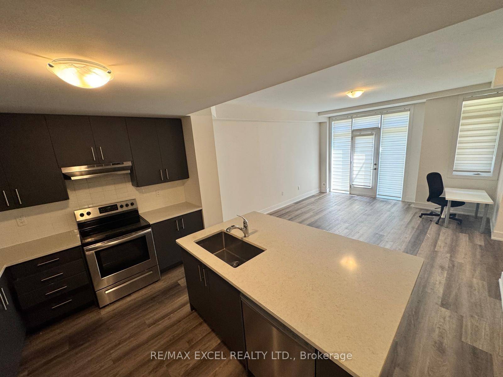 Beautiful one level stacked townhouse property with private direct access parking in your own garage.