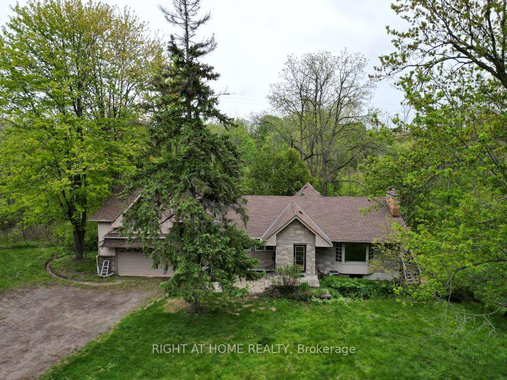 Rare custom built home with recent renovations, situated on nearly 5.