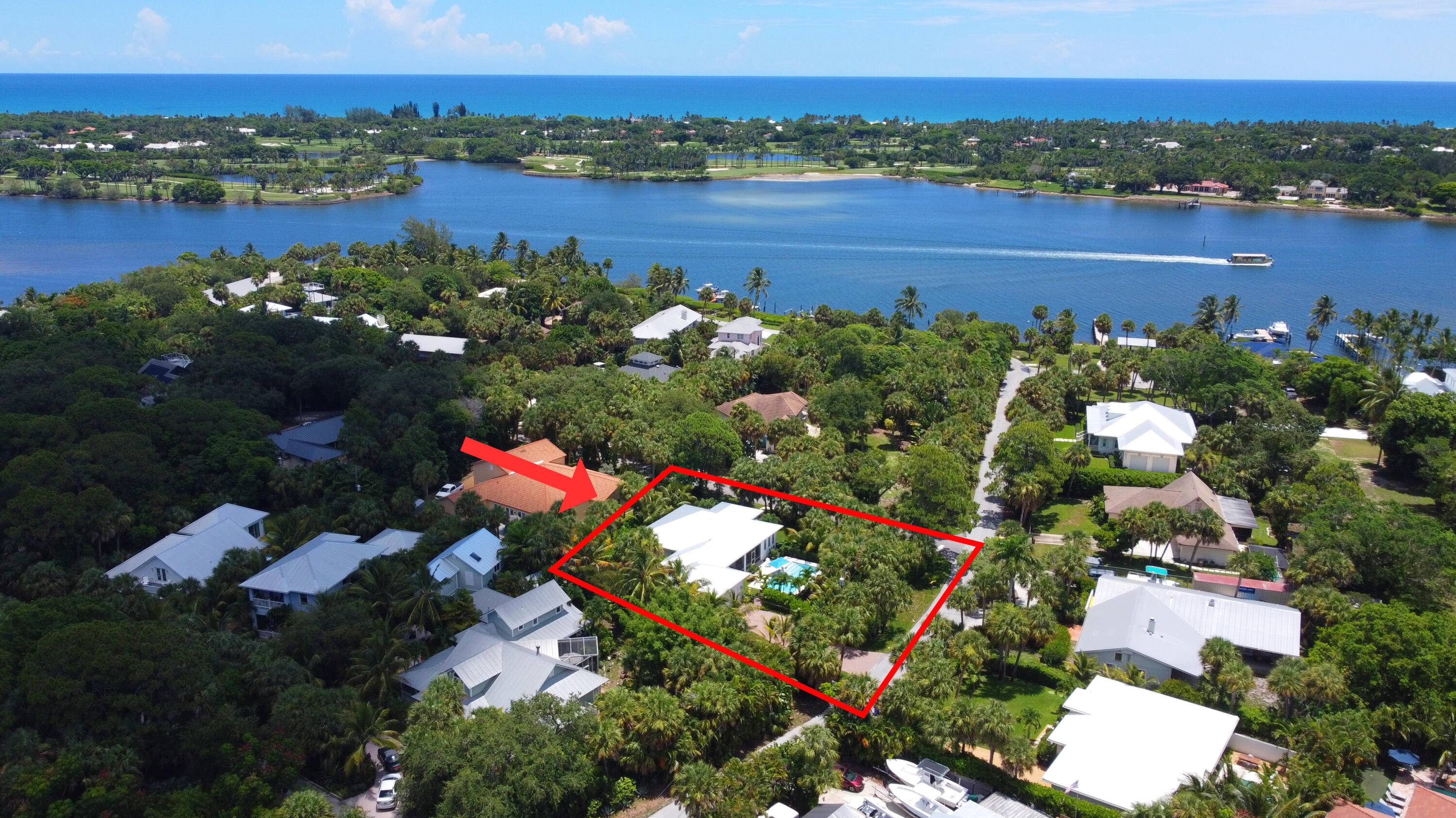 Newly built southern craftsman style home on private, lushly landscaped lot with saltwater pool.