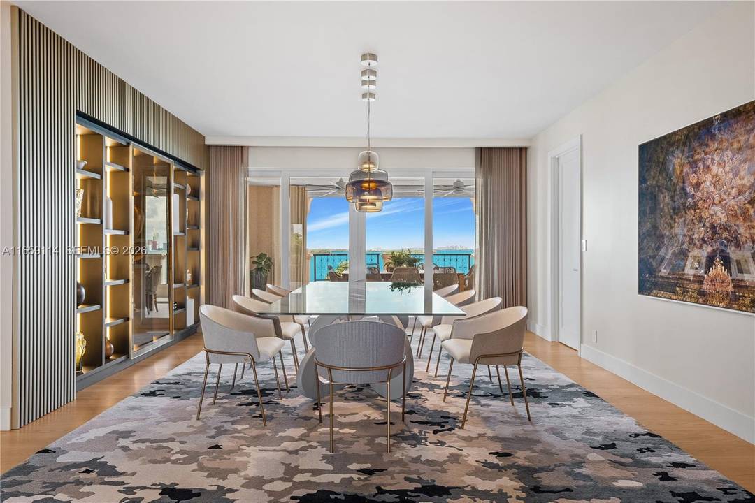 THE EPITOME OF LUXE LIVING WITH BREATHTAKING MIAMI SKYLINE amp ; OPEN BAY VIEWS THIS FISHER ISLAND RESIDENCE IS CURATED BY RENOWNED DESIGNER CARLA CANEPA !