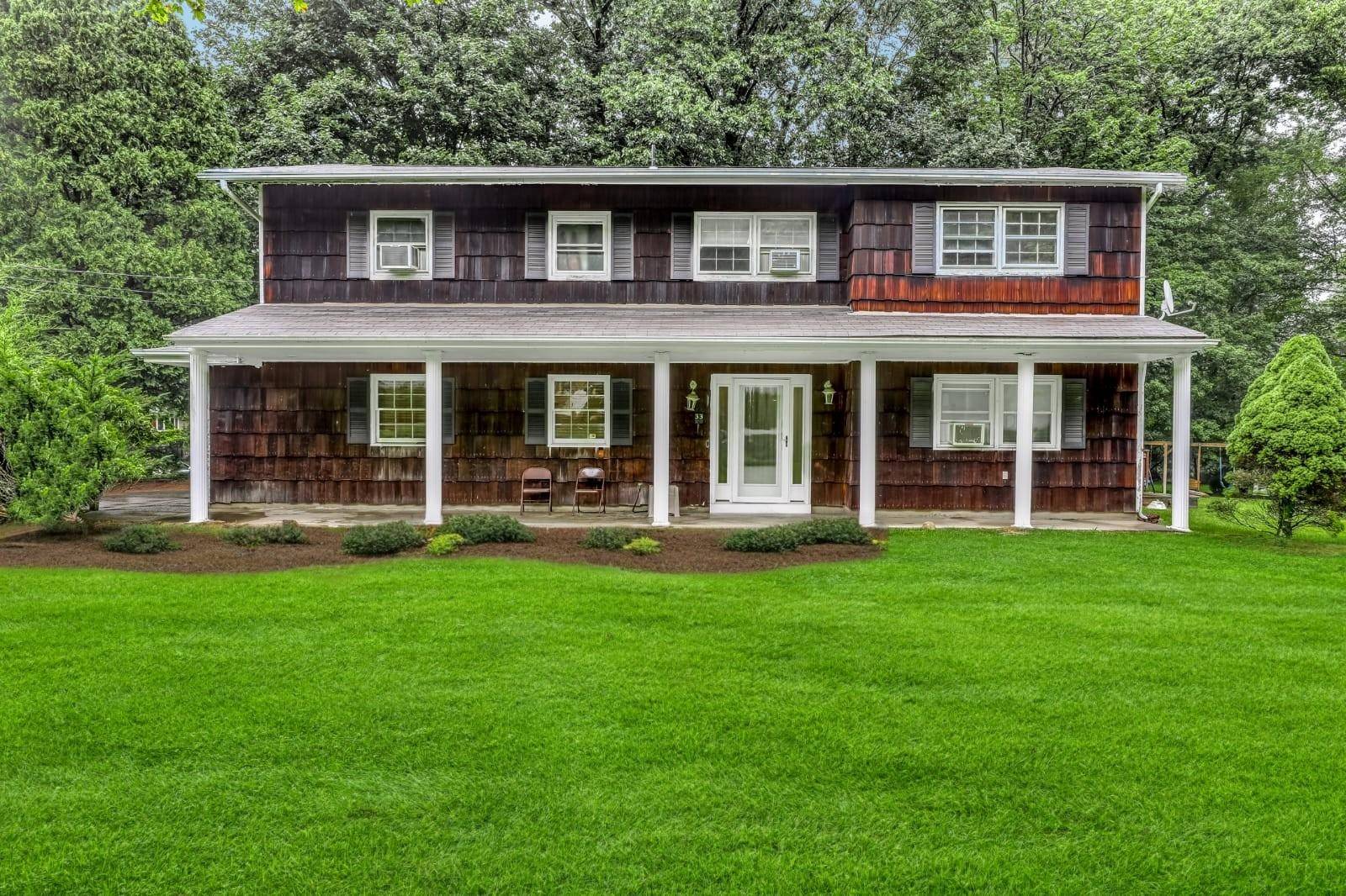 Situated on a spacious corner lot, this beautifully maintained 4 5 bedroom, 2.