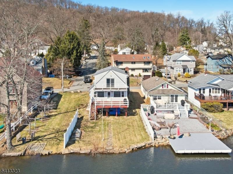 Bring your vision to this 4 bedroom, 2 bath lakefront home located in the highly sought after Indian Lake community of Denville.