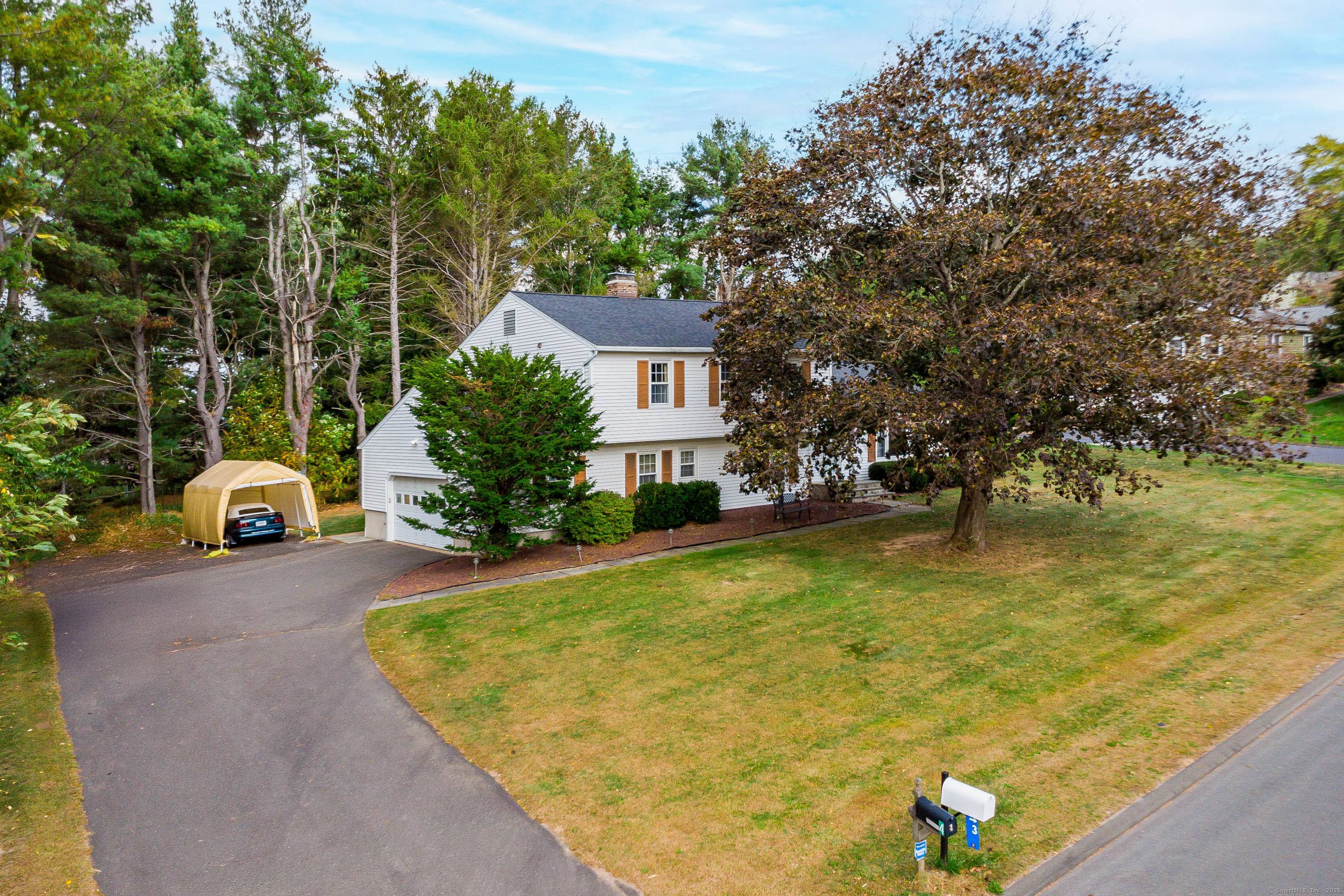 Welcome to 4 Winthrop Road, perfectly set in a sought after Bethel neighborhood.