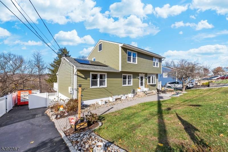 Step inside this beautiful colonial style home and immediately feel the warmth of the cozy living room perfect for relaxing at the end of the day.