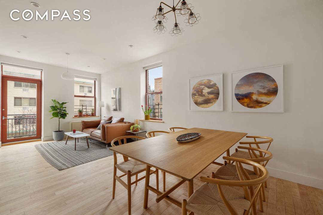 Nestled on the charming Tiffany Place, a picturesque cobblestone street in the historic Columbia Street Waterfront, this newly renovated, converted warehouse condo masterfully blends timeless character with contemporary elegance.