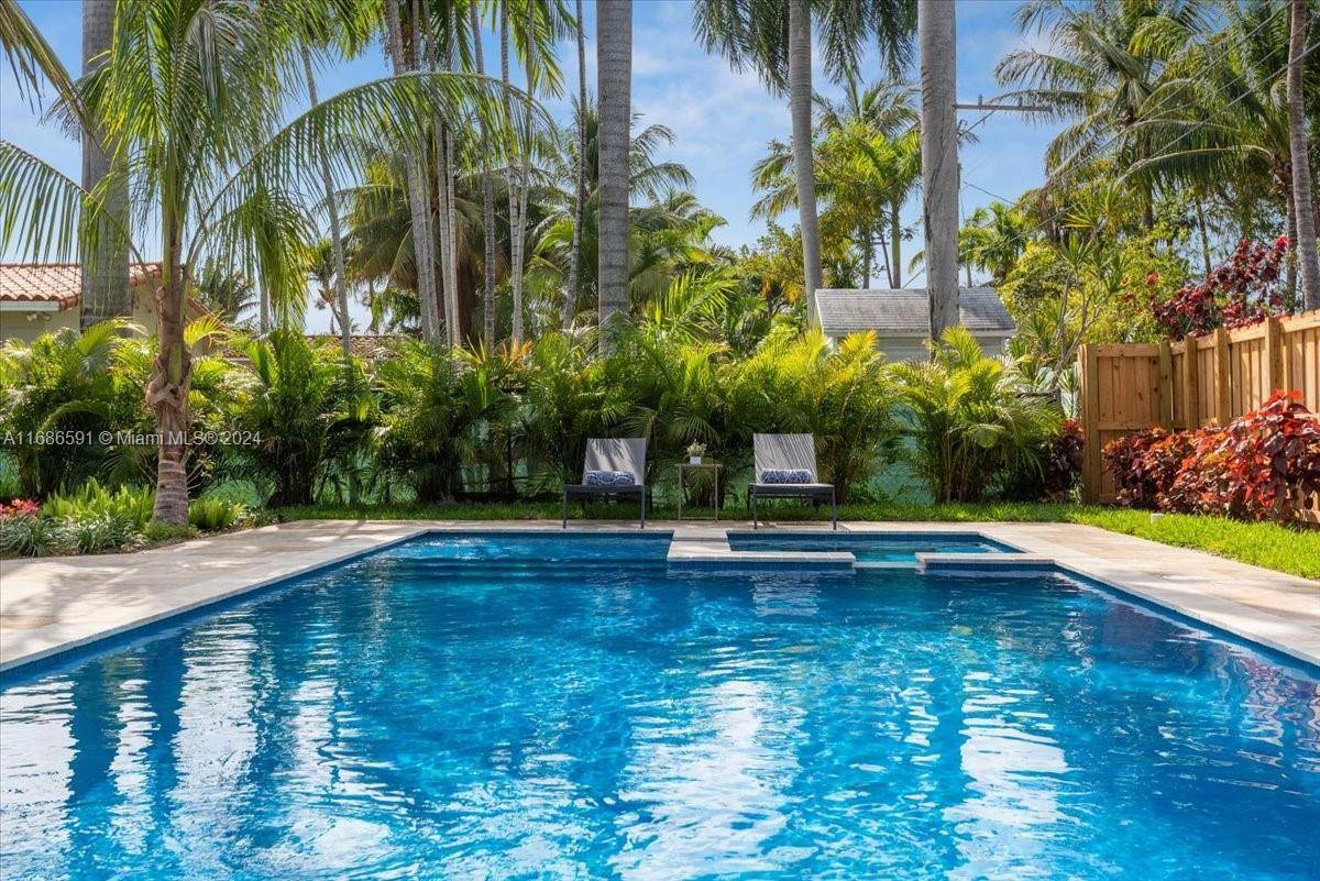 Unique, Breathtaking lush, professionally designed landscaping adorns this exquisite 2, 700sf 'one of a kind' warm amp ; precious gem with designer appointed finishes throughout.