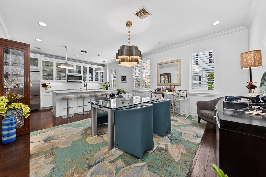 Stunning Cannery Row townhouse in Delray Beach's Pineapple Grove Arts District, a boutique community of only 82 residences ideally located near Atlantic Avenue's dining, shopping, entertainment and beaches.