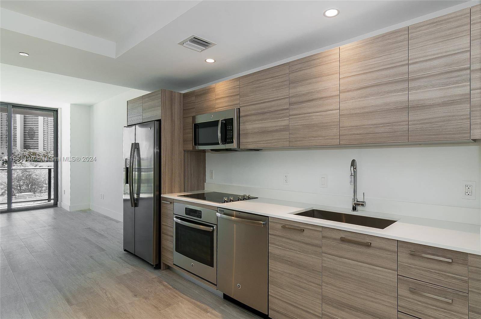 Large 1 Bed Den 1 Bath unit at the Hyde Midtown Suites amp ; Residences features, Tile flooring throughout, Kitchens by ItalKraft with SS Appliances.