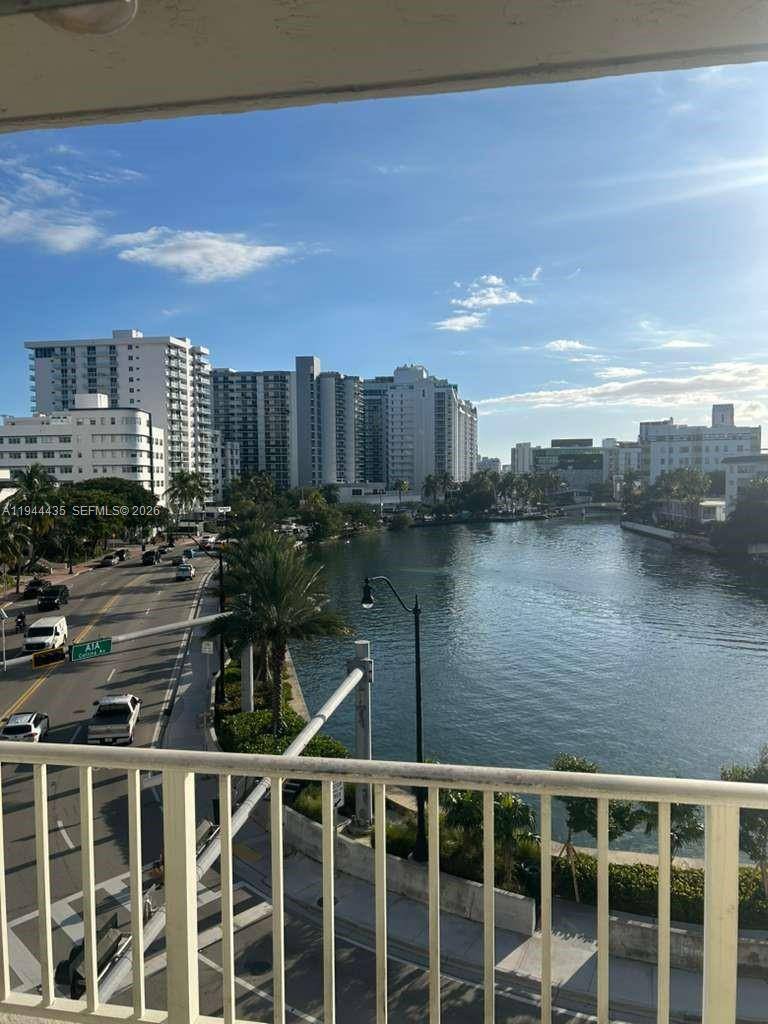 TOP FLOOR UNIT BEAUTIFUL VIEW FACING CANAL FRONT INDIAN GREEK WATERWAY WITH A BALCONY.