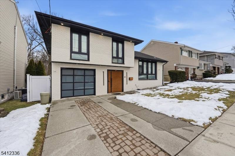 Floor to ceiling windows, a high tech revolving front door, and a full length deck overlooking Schmidts Wood set the tone for this beautifully renovated single family home in Secaucus' ...