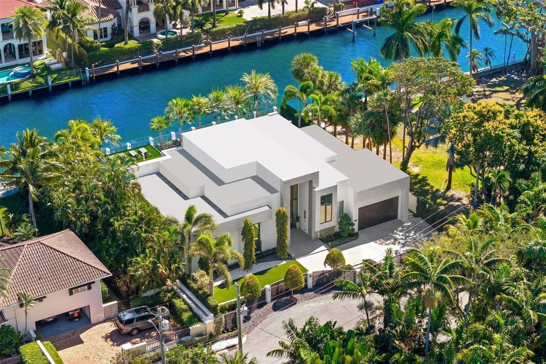 Positioned one home off the point in Fort Lauderdale s sought after Las Olas Isles, this fully gated modern one story custom waterfront residence offers 100 feet of water frontage ...