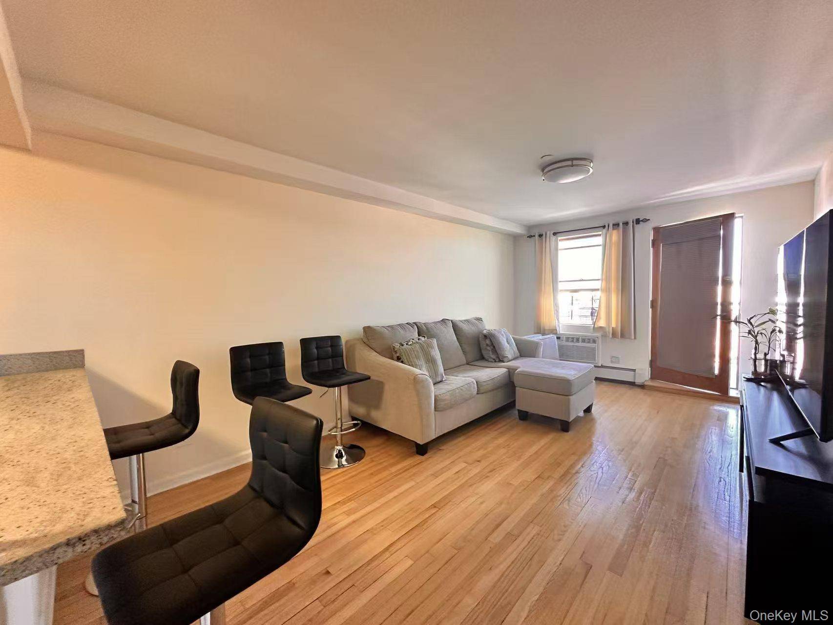 Stylish 1 Bedroom Condo with Balcony in Prime Jackson Heights Corona Location.