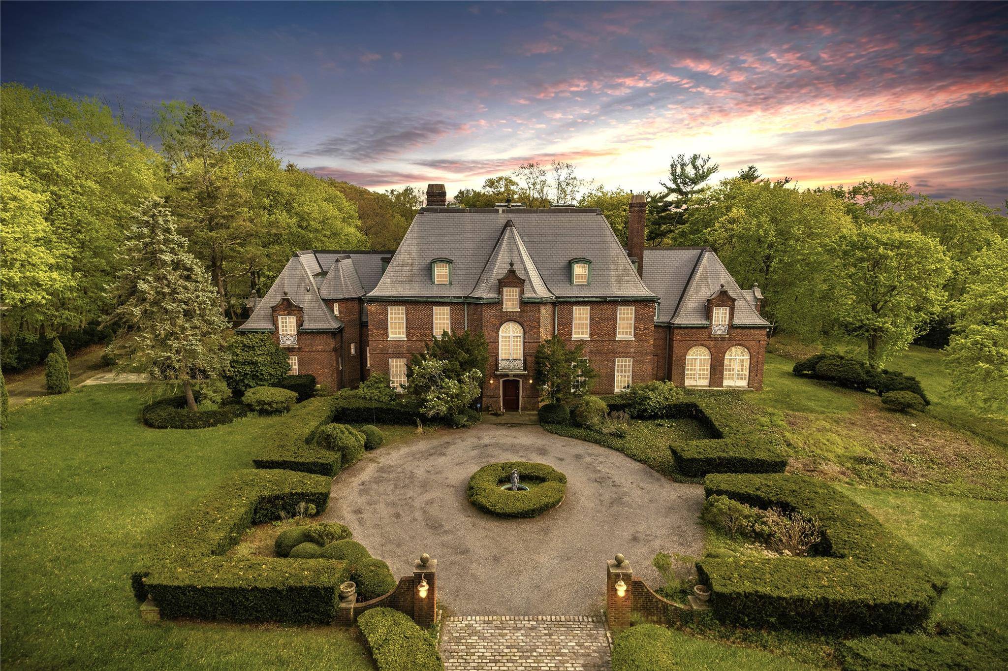 10 Auserehl Court stands as a treasured landmark in the heart of Huntington an extraordinary residence steeped in history and grace.
