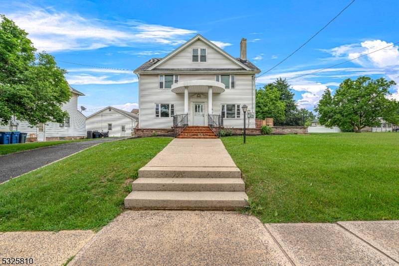 Welcome to this stunning Neoclassic Colonial, where timeless charm meets modern elegance.