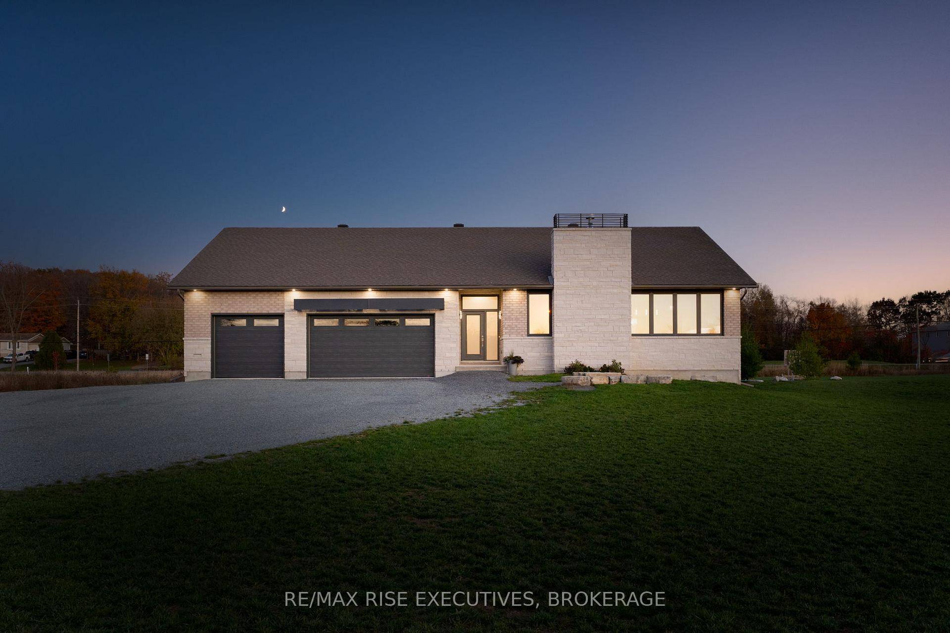 Nestled just minutes north of Kingston, this luxurious estate style home combines timeless craftsmanship with modern sophistication.