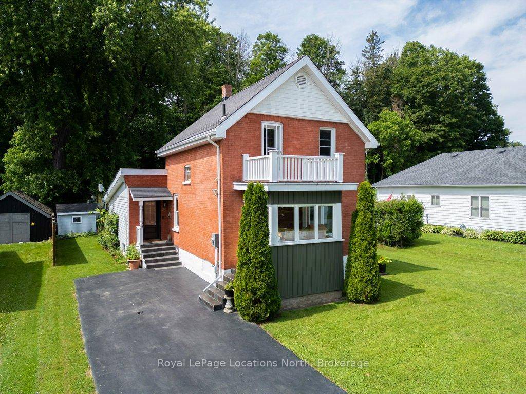 Welcome to 25 Edwin Street, a beautifully maintained century home full of character and charm, nestled on a quiet street in the heart of Meaford, backing onto nature.