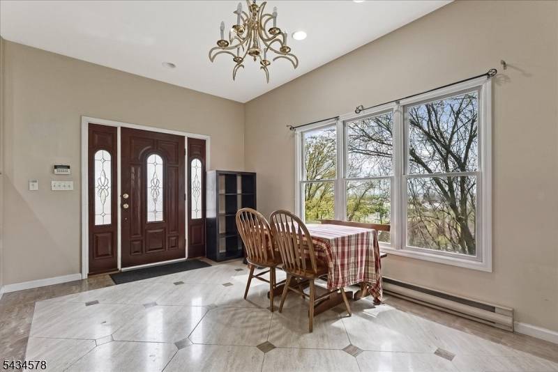 3 Bedroom and 2 Bathroom Home with Oversized Bedrooms, Private Primary Suite Peaceful Dead End LocationSet on an elevated lot at the end of a quiet street, this 3 bedroom, ...