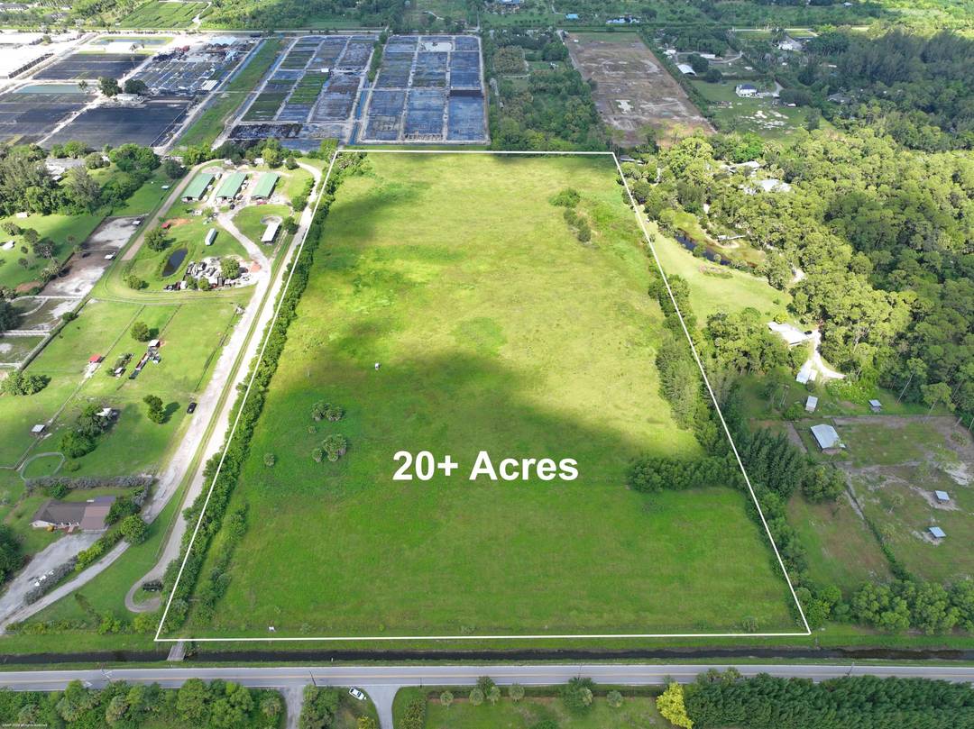 Exceptionally private 20 ACRE property on paved E road with easy access to Okeechobee Rd.