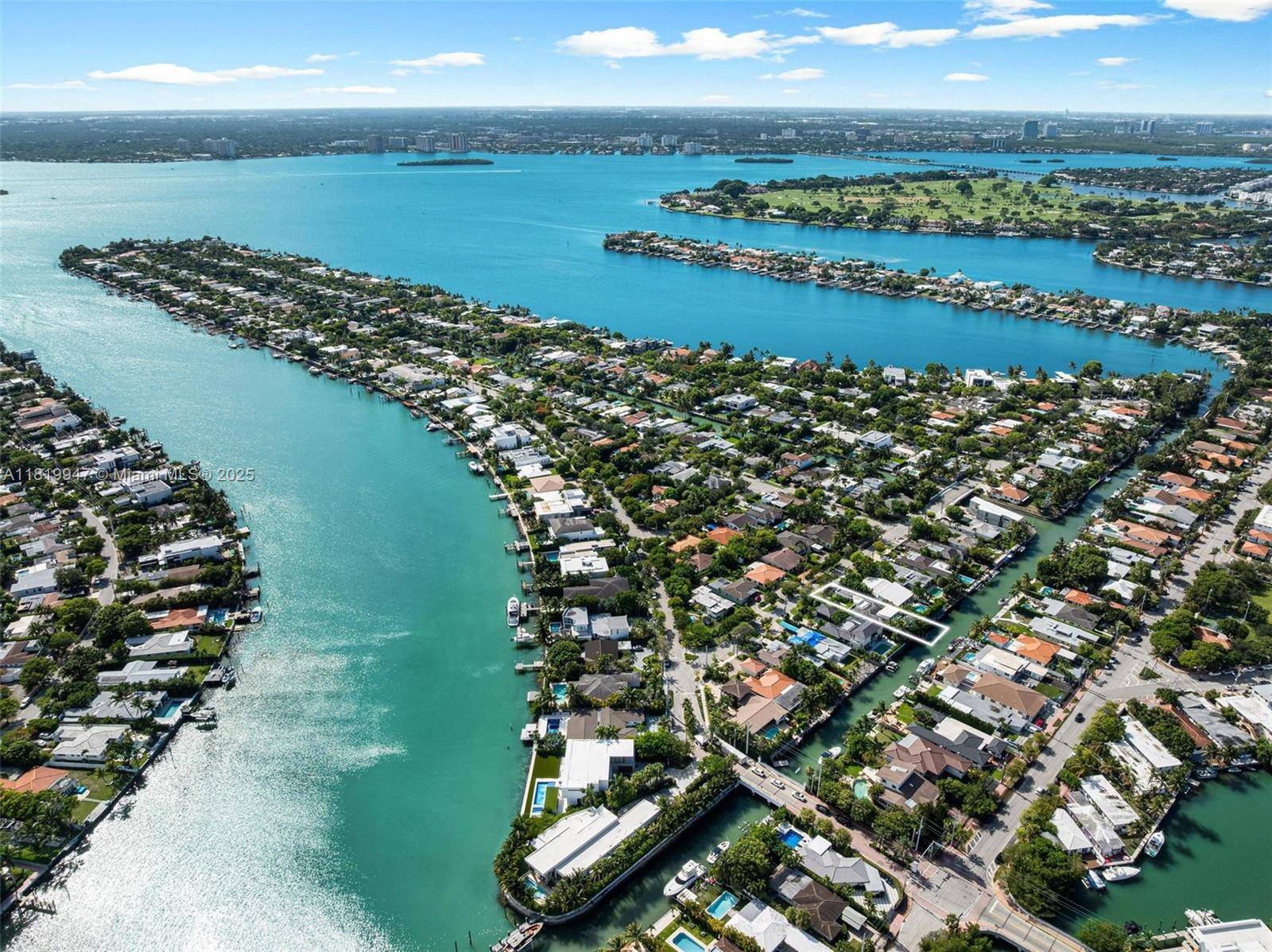 Beautifully renovated one story waterfront home located in the guard gated community of Biscayne Point.