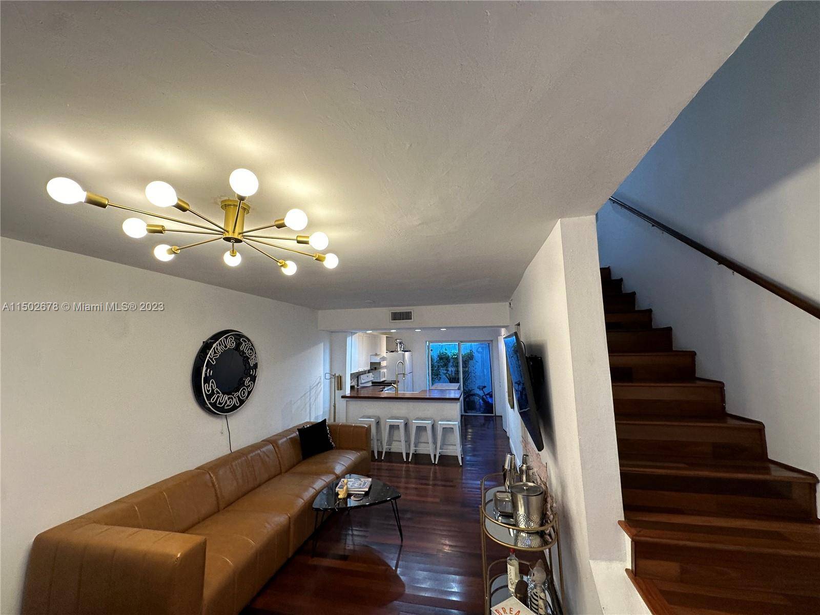 Experience South Beach living at its best in this solidly built two story 2 bedroom town house featuring 2 mosaic tiles bathrooms, a desirable private patio, beautiful Brazilian cherry wood ...
