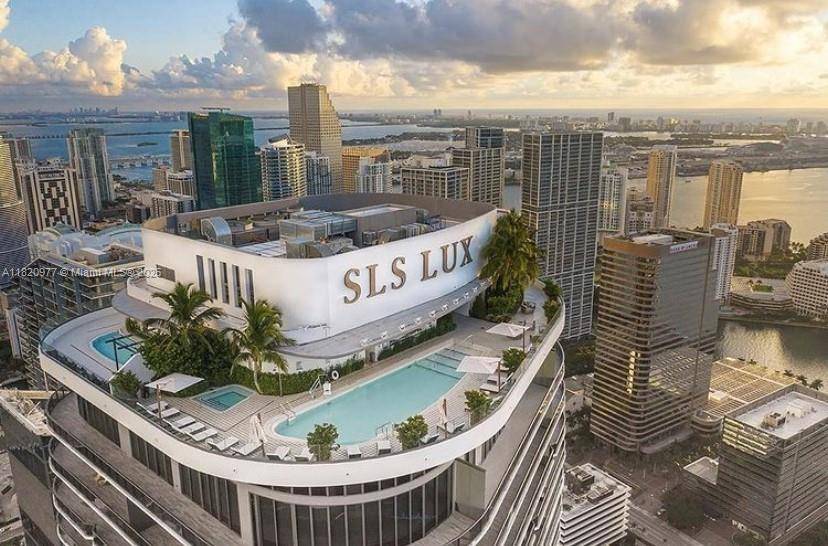 Wonderfully furnished amp ; equipped 2 bed 2 bath unit in SLS Lux sold turn key !