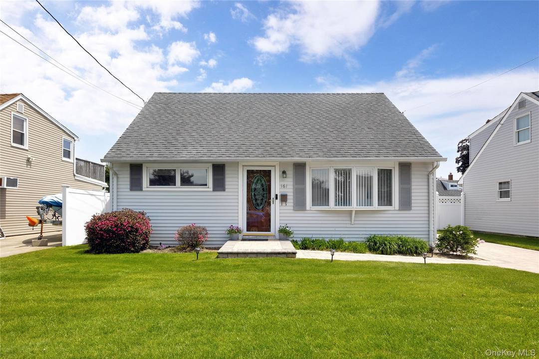 Charming Cape Cod in the heart of Massapequa.
