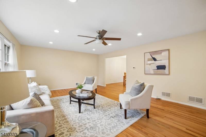 Set on a generous. 28 acre property in the heart of Cranford, this 4 bedroom, 2.