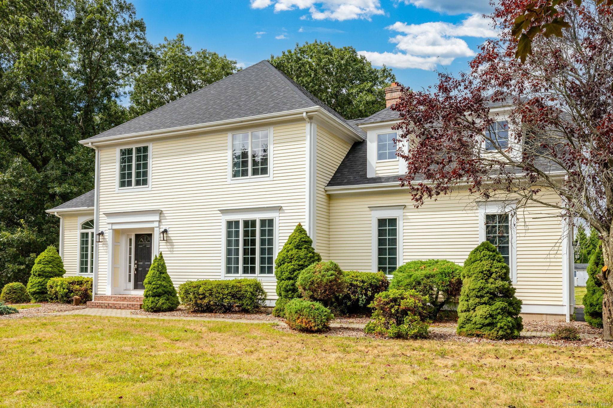 Don't miss this elegant Colonial in highly coveted South Glastonbury Neighborhood !