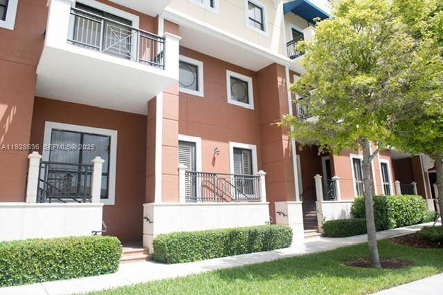 Spacious two story, townhouse style unit in the desirable Colonnade building near Dadeland Mall.
