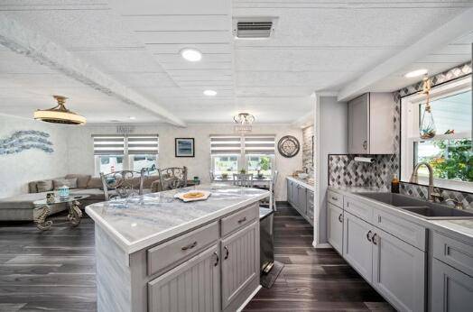 FULLY REMODELED MINI GREEN for PETS at this 2 bed 2 bathroom beauty where SAFETY FEATURES merge w SOPHISTICATION.