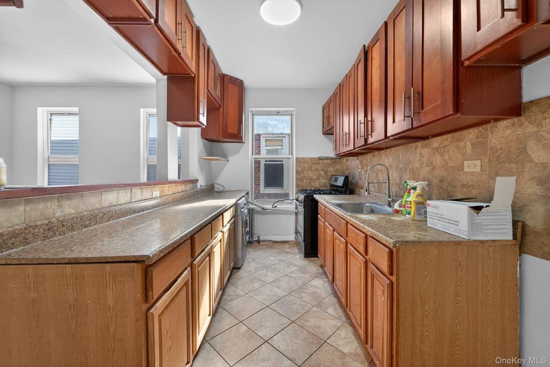 Opportunity Knocks ! Ideal for savvy investors and primary home owners alike 667 Hemlock Street is a 20x63 built 100 brick LEGAL 3 Family sitting on a beautiful, tree lined ...
