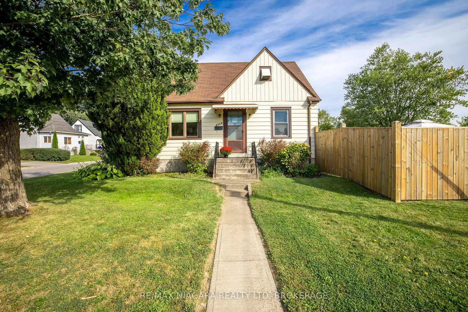 Welcome to this charming starter home located at 4939 Hamilton Street.