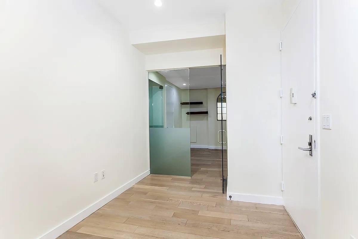 Live, Work, and Invest in the Heart of FiDi Welcome to Residence 18FG at 75 Wall Street a rare and expansive 3 bedroom plus home office corner unit with panoramic ...