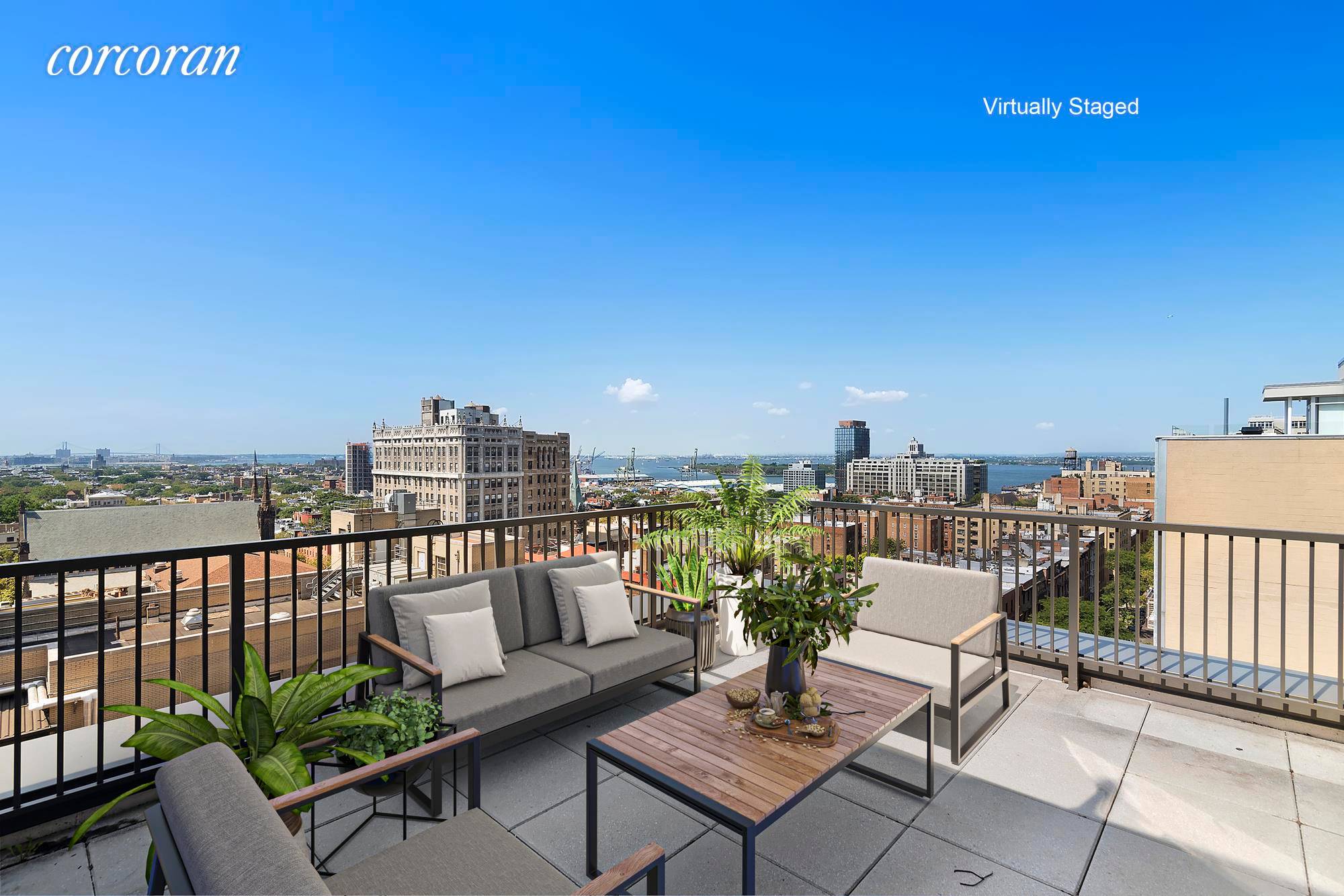 Massive three bedroom two bathroom home with spectacular city and harbor views from two private terraces.