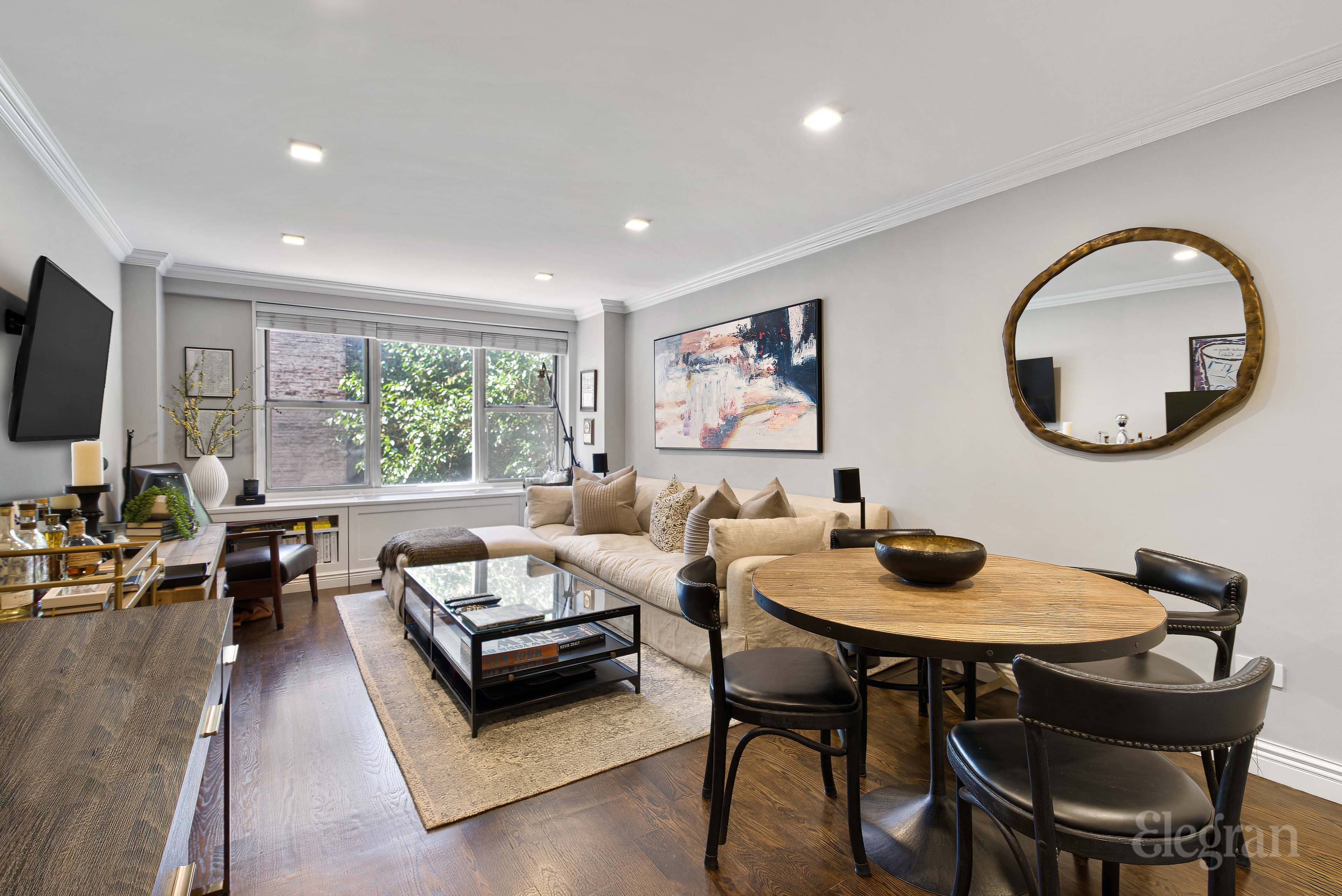 Step into an oversized one bedroom apartment that is flooded with natural light from six large west facing windows, hardwood strip flooring, and FIVE custom closets no stone was left ...