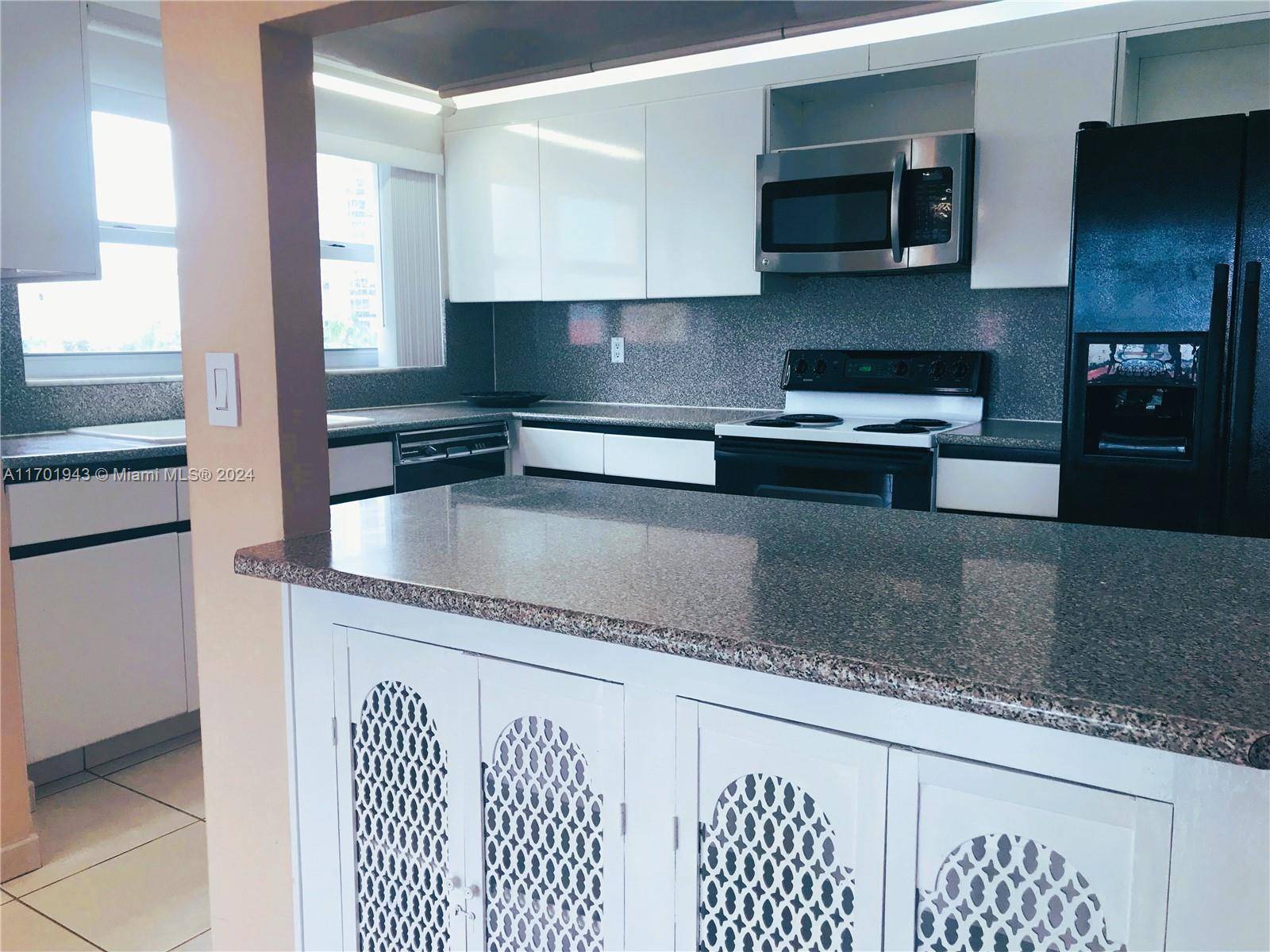Beautiful, updated condominium with a spectacular, bright, and spacious 2 bedroom, 2 bathroom corner unit in the east building just across from the ocean.