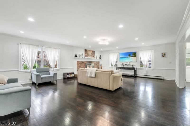 Welcome to this beautifully updated home in desirable Cranford Township, offering 4 bedrooms and 3.