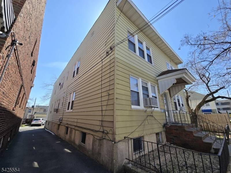 Excellent opportunity to own a cash flowing 4 family rental property with strong upside potential to convert to a 6 family buyer to verify zoning and approvals.