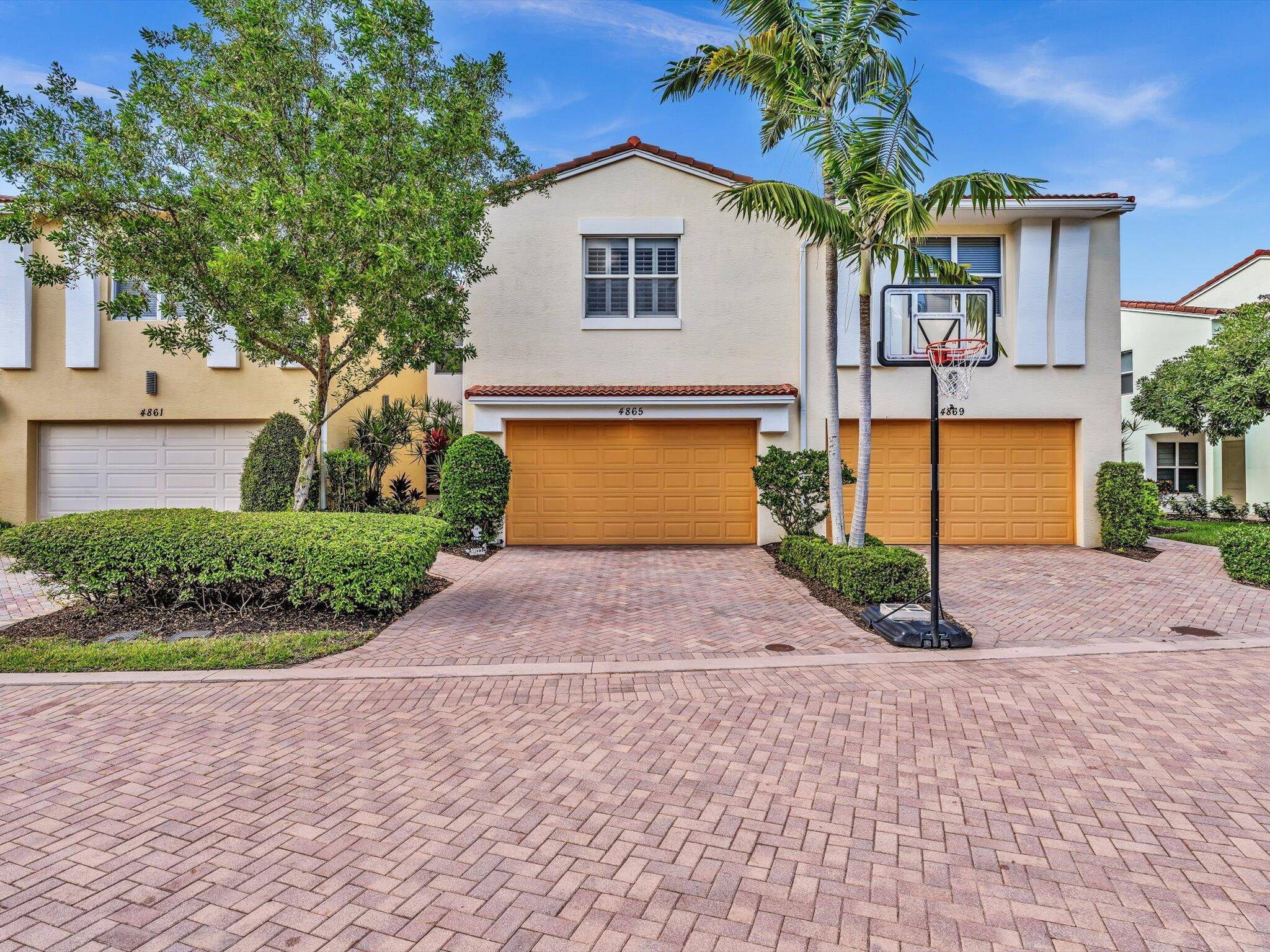 Centra Boca Raton turnkey townhome with sweeping views of the Pond Hawk Natural Area boasts 3 bedrooms, a loft area, two full bathrooms, and powder room with attached two car ...
