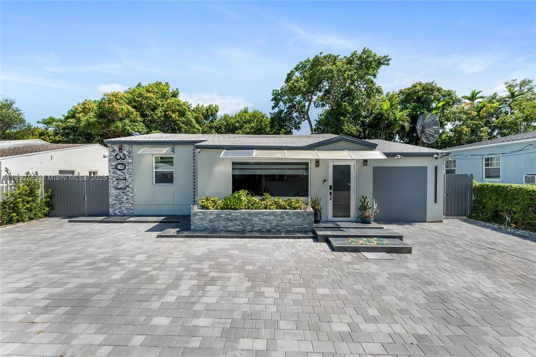 Step into this beautifully remodeled single family home featuring 3 bedrooms, 2 modern bathrooms, a brand new roof, stylish new floors, and a sleek kitchen with quartz countertops.