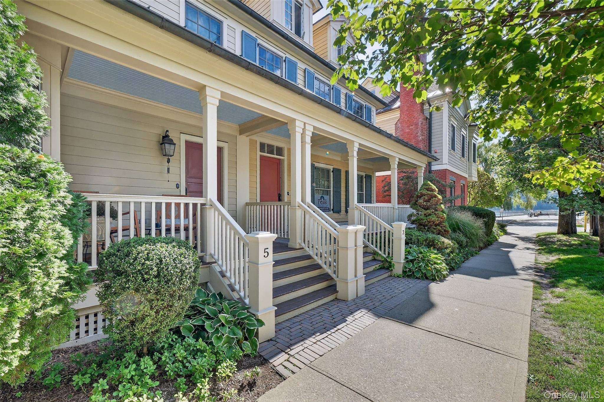 Welcome to this charming front porch townhome, perfectly blending comfort, convenience, and style in the heart of Historic Cold Spring Village.