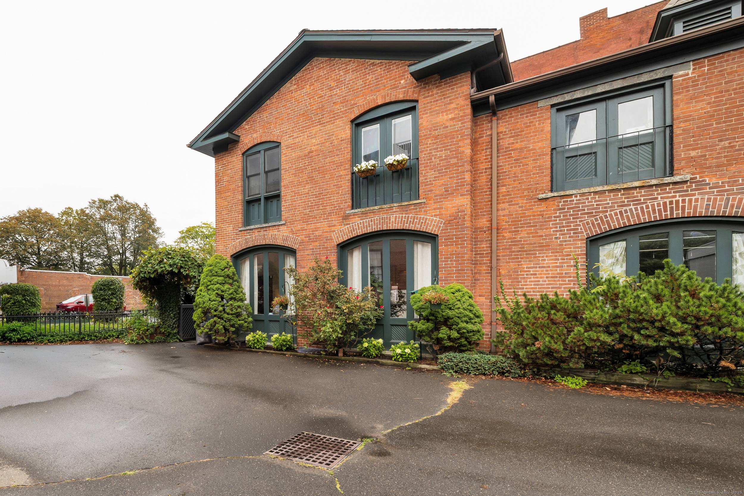 Housed in a beautifully converted former carriage house, this unique residence blends classic charm with modern design.