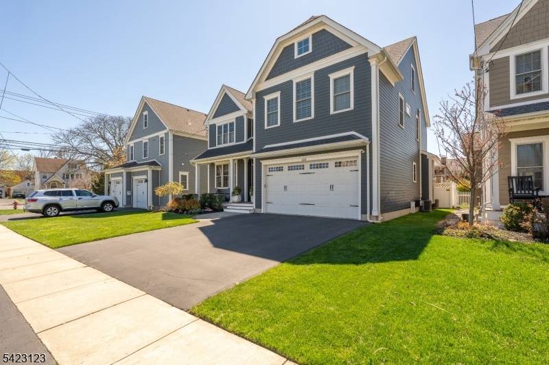 This modern Colonial is filled with timeless character that boasts high end, modern style.